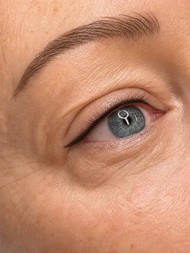 Close-up of classic eyeliner tattoo on mature skin at ELKA CLINIC Perth